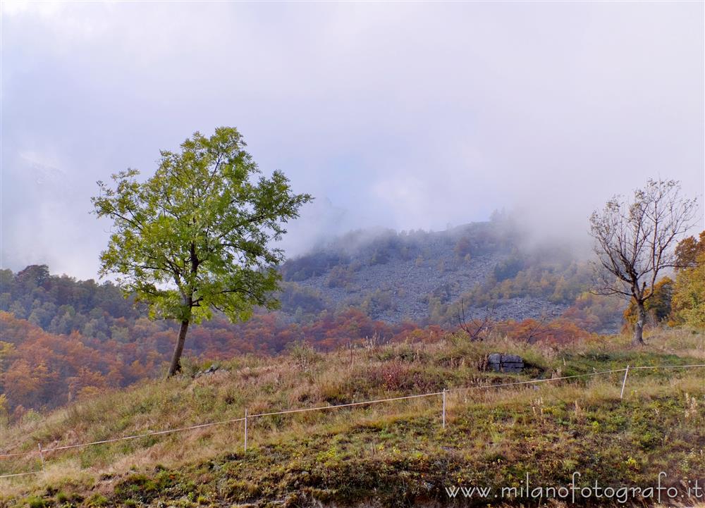 Campiglia Cervo (Biella, Italy) - Autumn landscape with low clouds above the Sanctuary of San Giovanni of Andorno